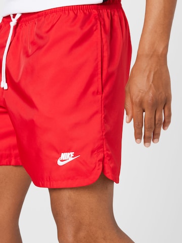 raudona Nike Sportswear Standartinis Kelnės 'Essentials'