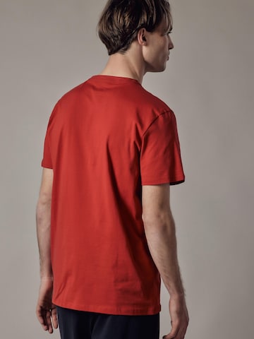 Maglietta 'T-Shirt Scollo a V' di OWN Off With Nature in rosso