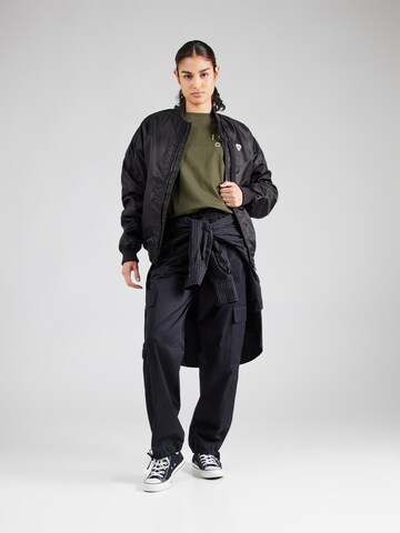 Maglietta di Champion Authentic Athletic Apparel in verde