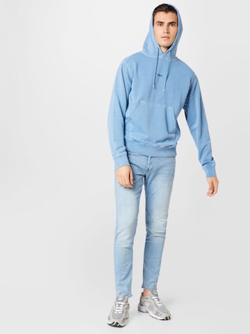 BOSS Sweatshirt 'Wefadehoody' i blå