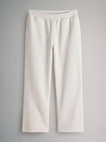 The Set Trenirka za tek | bež barva