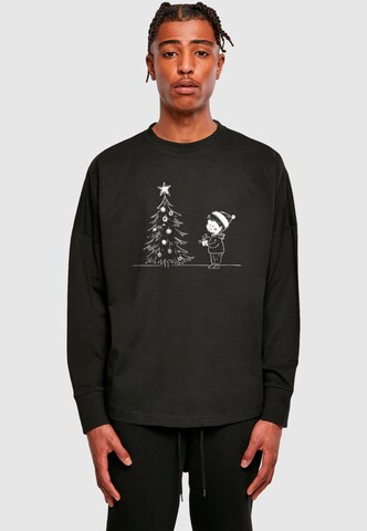 Merchcode Shirt 'Christmas Cute Kid' in Zwart: voorkant