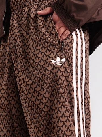 ADIDAS ORIGINALS - Loosefit Pantalón 'FIREBIRD' en marrón