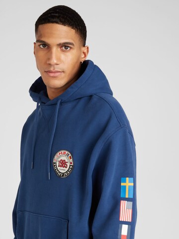Tommy Jeans Mikina 'ARCHIVE GAMES' – modrá