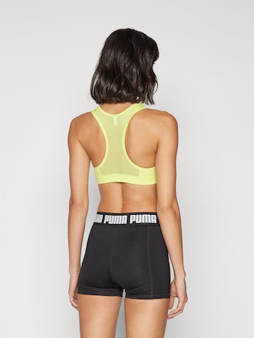 PUMA Bustier Sport bh in Geel