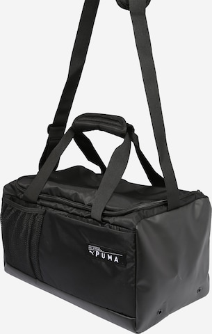 PUMA Sports Bag in Black: front