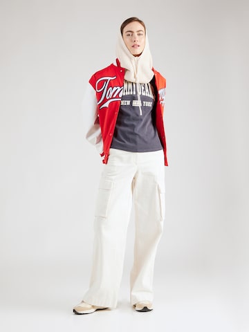 Tommy Jeans T-shirt 'Varsity' i blå