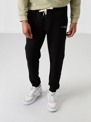 Tommy Life Jogginganzug in Schwarz