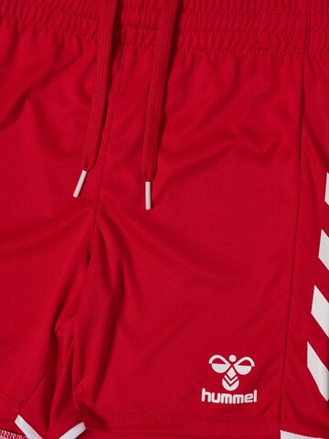 Hummel Regular Sports trousers in Red