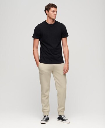 Superdry Tapered Hose 'ESSENTIAL' in Beige