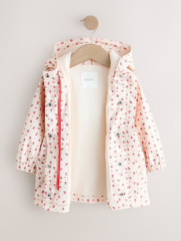 Palton de la Next pe bej