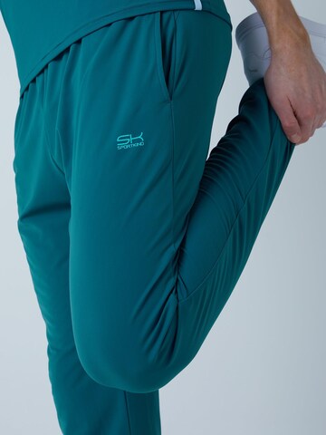 Coupe slim Pantalon de sport 'Slim Training Pants' SPORTKIND en vert