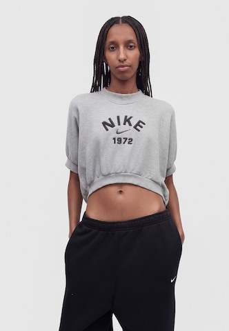 Nike Sportswear - Pierna ancha Pantalón 'Studio' en negro
