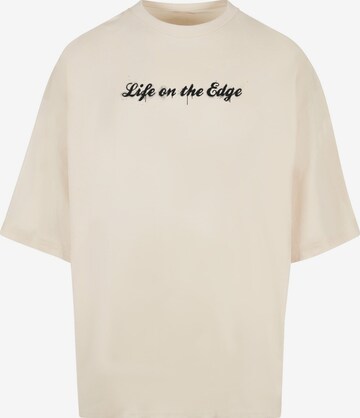 Merchcode Shirt 'Peanuts - Life on the edge' in Beige: voorkant
