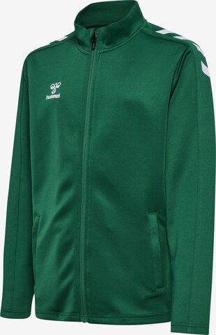 Veste de survêtement 'CORE XK POLY' Hummel en vert