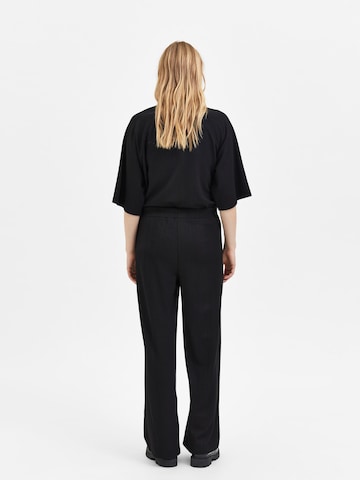 SELECTED FEMME - Pierna ancha Pantalón 'RAGNILD' en negro