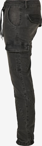 Urban Classics - Tapered Pantalón vaquero cargo en negro