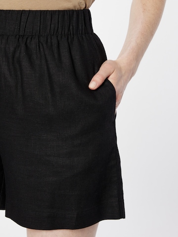 modström Lużny krój Spodnie 'Darrel' w kolorze czarny