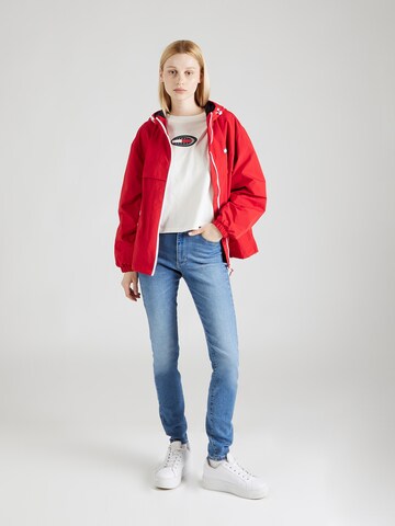 Tommy Jeans Prechodná bunda 'CHICAGO' - Červená