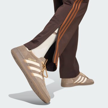 regular Pantaloni 'Firebird' di ADIDAS ORIGINALS in marrone
