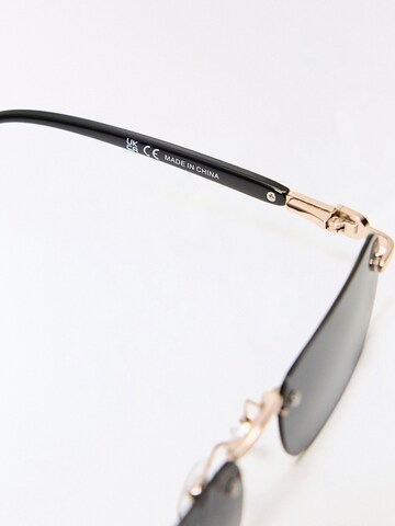 Lunettes de soleil Bershka en noir