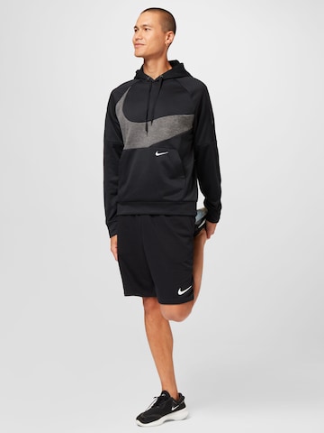 NIKE Sport sweatshirt i svart