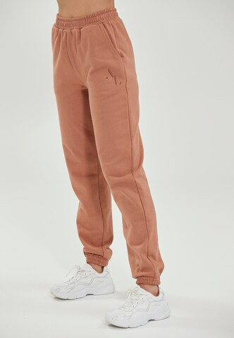 Athlecia Loose fit Workout Pants 'Lia' in Brown: front