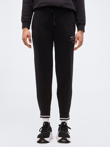 PUMA Tapered Sportbyxa 'CLASS' i svart: framsida