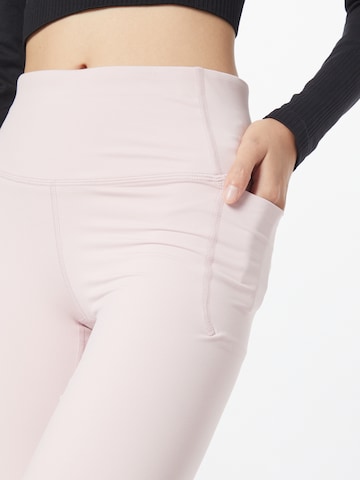 UNDER ARMOUR Slim fit Sports trousers 'Meridian' in Pink