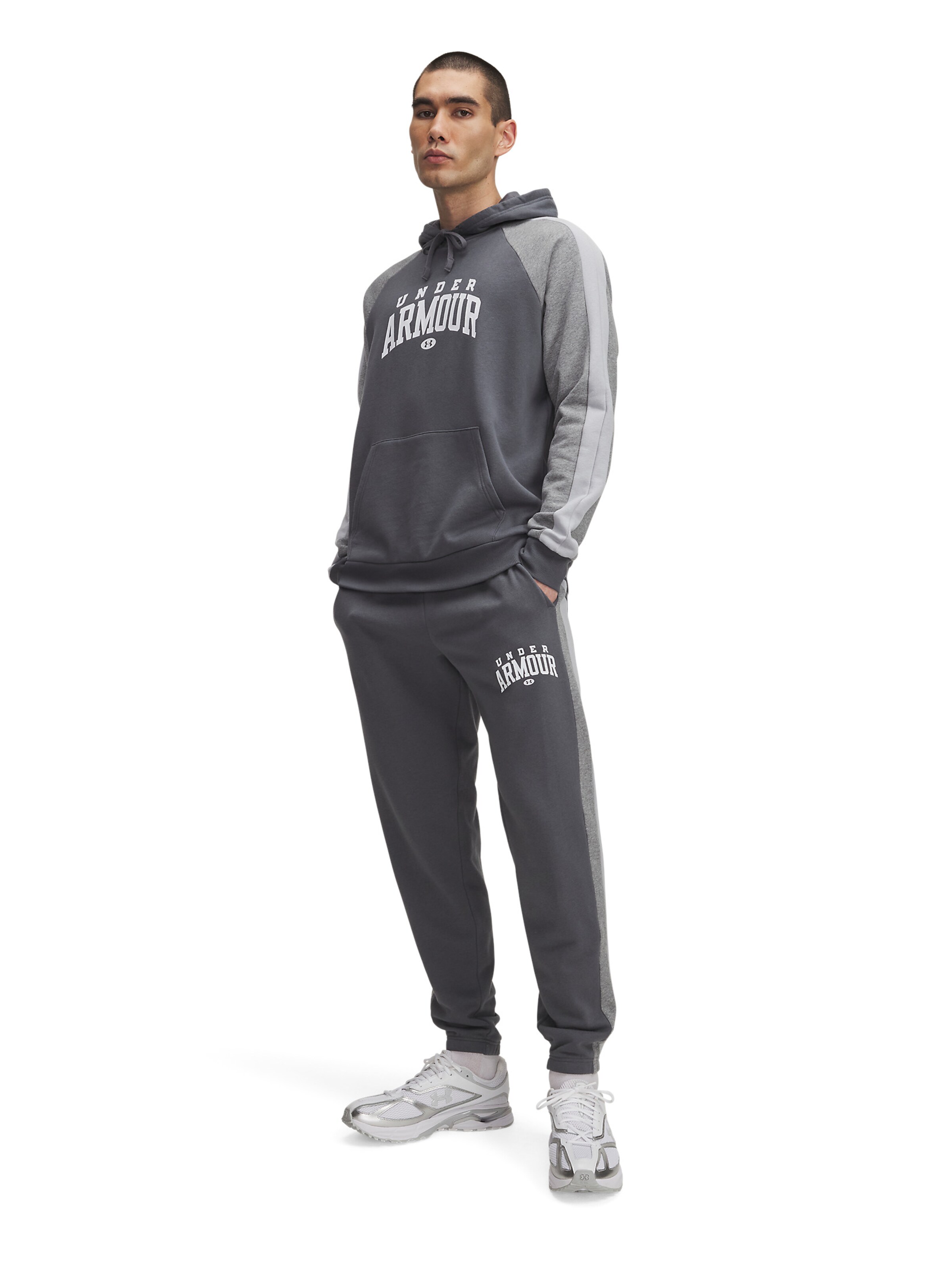 UNDER ARMOUR Tapered Sports trousers in Grey: front