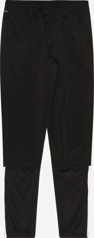 PUMA Slim fit Sports trousers in Black
