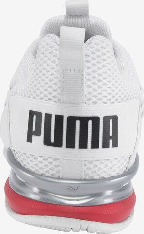 Chaussure de course 'Axelion' PUMA en blanc