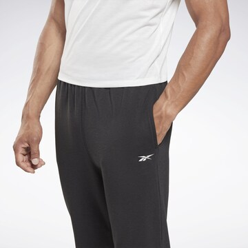 Reebok Tapered Workout Pants in Black