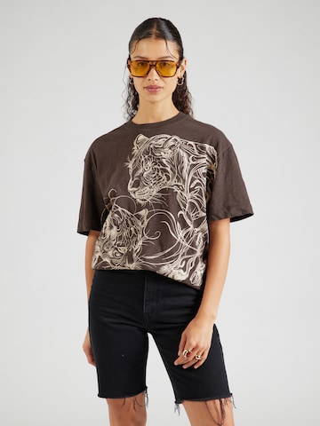 T-shirt 'PANTHERS' GUESS en marron : devant