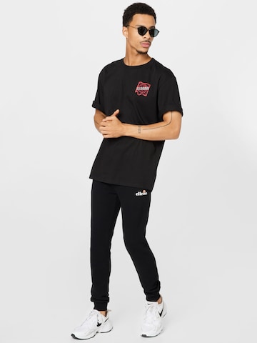 ELLESSE Tapered Hose 'Granite' in Schwarz | ABOUT YOU