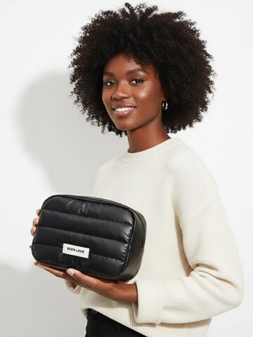 MEVYRA Toiletry Bag in Black: front