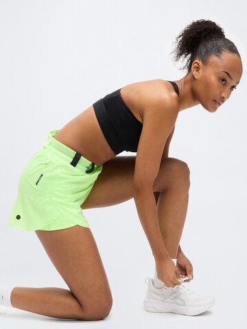 ASICS Regularen Športne hlače | zelena barva