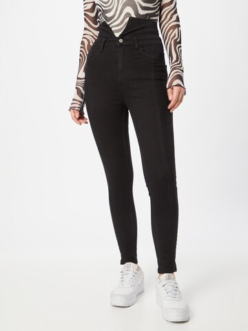 Skinny Jeans de la Trendyol pe negru: față