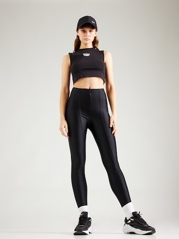 Reebok Skinny Leggingsit 'RESPECT HER' värissä musta