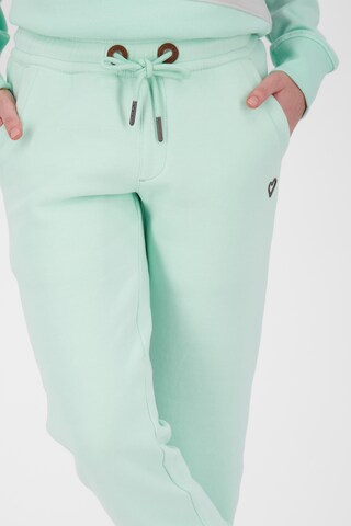 Tapered Pantaloni 'MonalieAK' di Alife and Kickin in verde