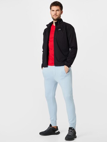 TOM TAILOR DENIM Tapered Byxa i blå