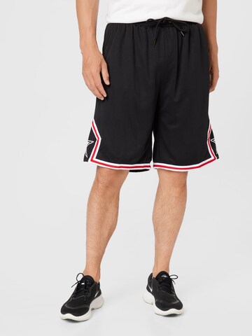 Starter Black Label Loosefit Shorts in Schwarz: predná strana