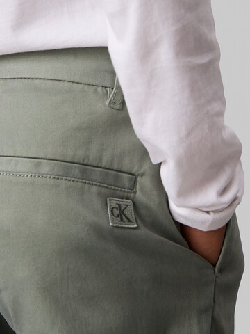 Regular Pantalon 'Ceremony' Calvin Klein Jeans en vert