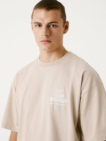 Maglietta 'TEAM RECORDS' di Red Bull Racing x Pepe Jeans in beige