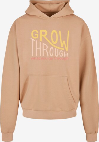 Sweat-shirt 'Spring - Grow through 2' Merchcode en beige : devant