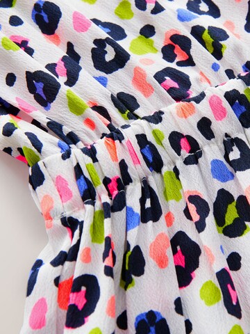 Ensemble Next en mélange de couleurs