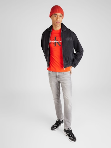 Calvin Klein Jeans Μπλουζάκι σε πορτοκαλί