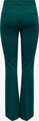 ONLY Rozkloszowany krój Spodnie w kant 'PEACH' w kolorze zielony