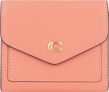 COACH Wallet in Orange: front
