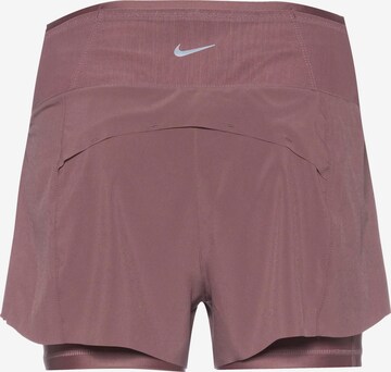 NIKE Loosefit Sporthose 'SWIFT' in Braun